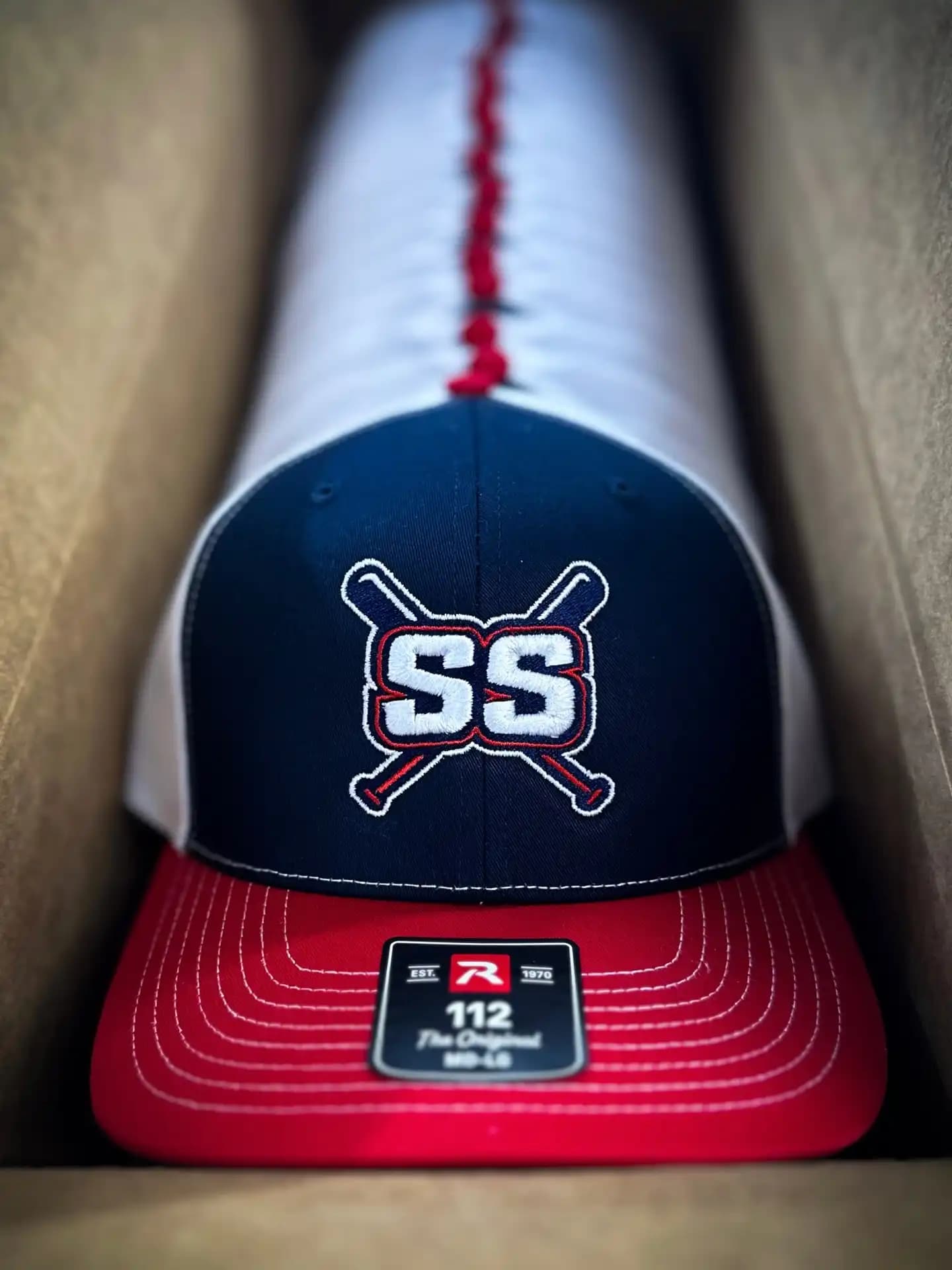 Richardson 112 baseball caps with a 3D puff SS baseball bat mascot, created via 100% manual digitizing to ensure sharp detail on curved headwear.